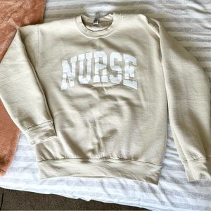Etsy “NURSE” crewneck sweater